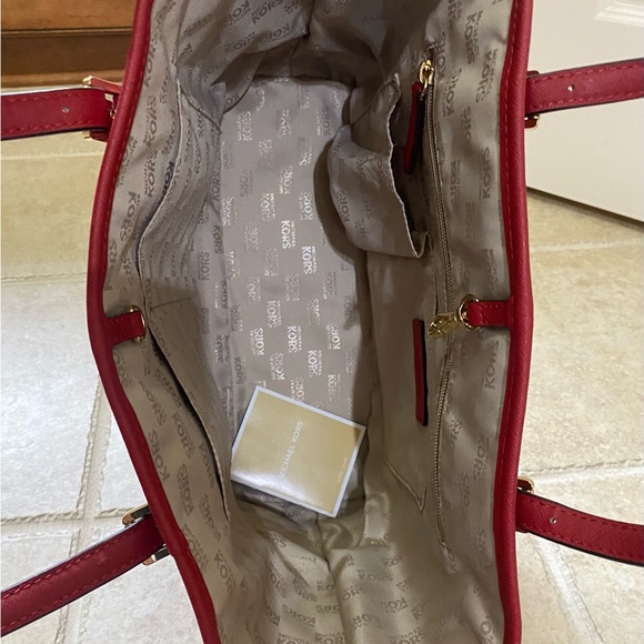 Michael Kors cherry red purse. VGUC, multiple pockets to neatly carry items. - Picture 6 of 13